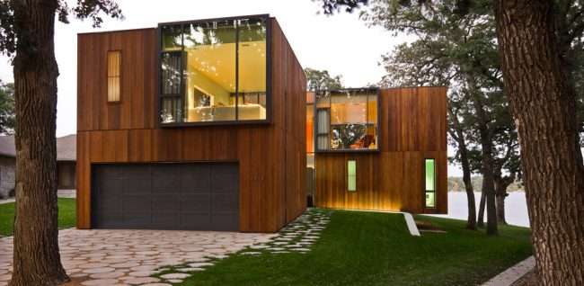 Проект будинку з двома гаражами: вибираємо найкраще готове рішення для будівництва