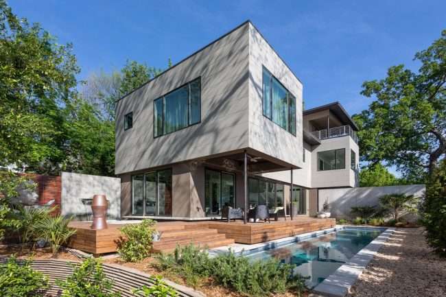 Гумова фарба по бетону: оптимальне рішення для оформлення фасаду, покрівлі та басейну