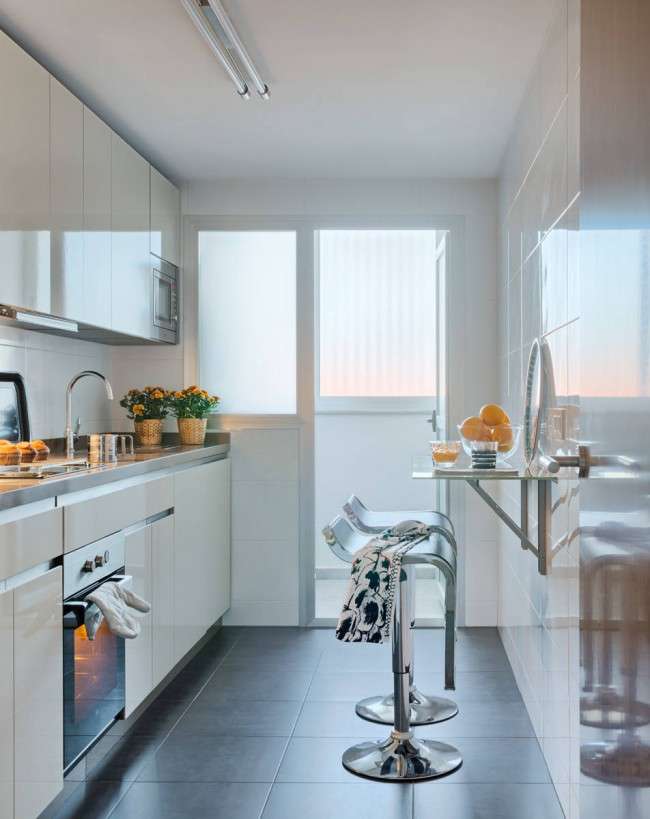 Стильний інтерєр кухні 9 кв. метрів: принципи організації простору для комфорту всієї сімї (фото)