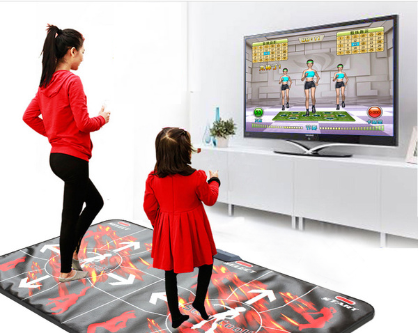 Танцювальний килимок з підключенням до телевізора: принцип роботи та поради з вибору